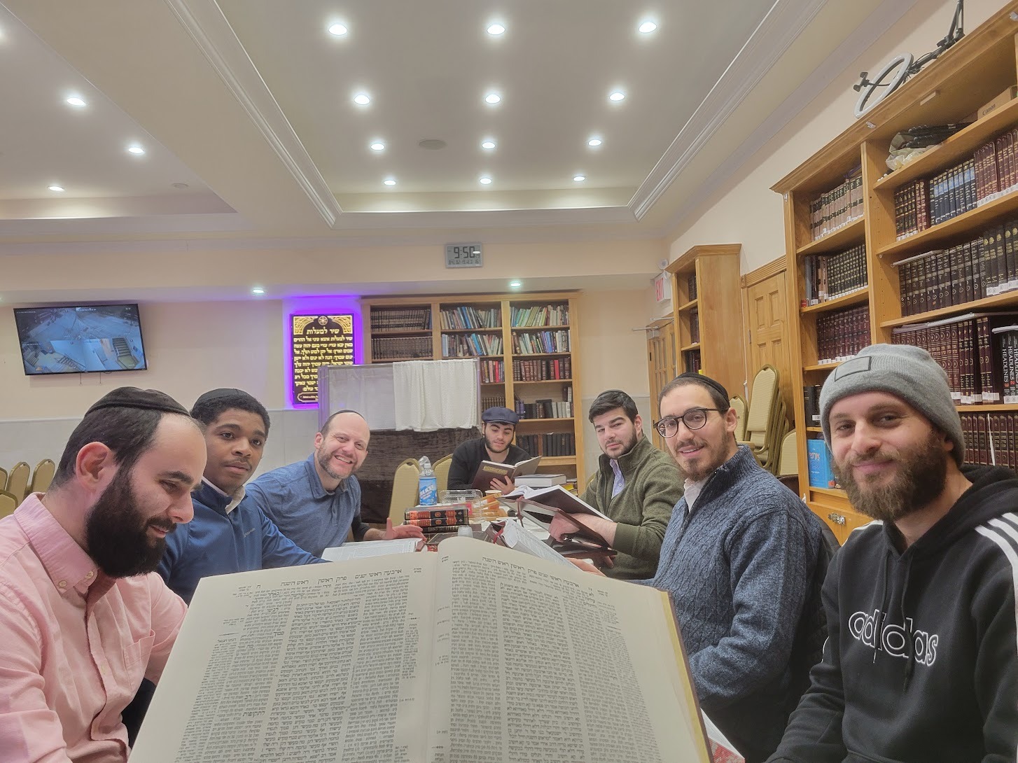 Students learning around the Gemara